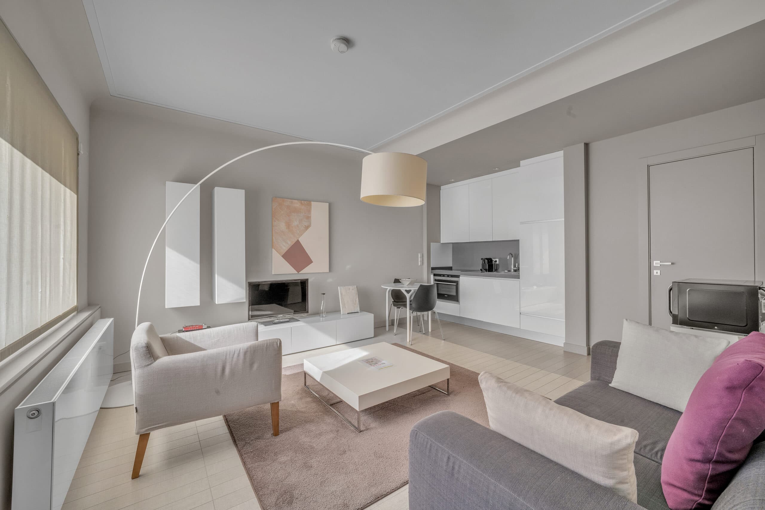 Living room with balcony doors.