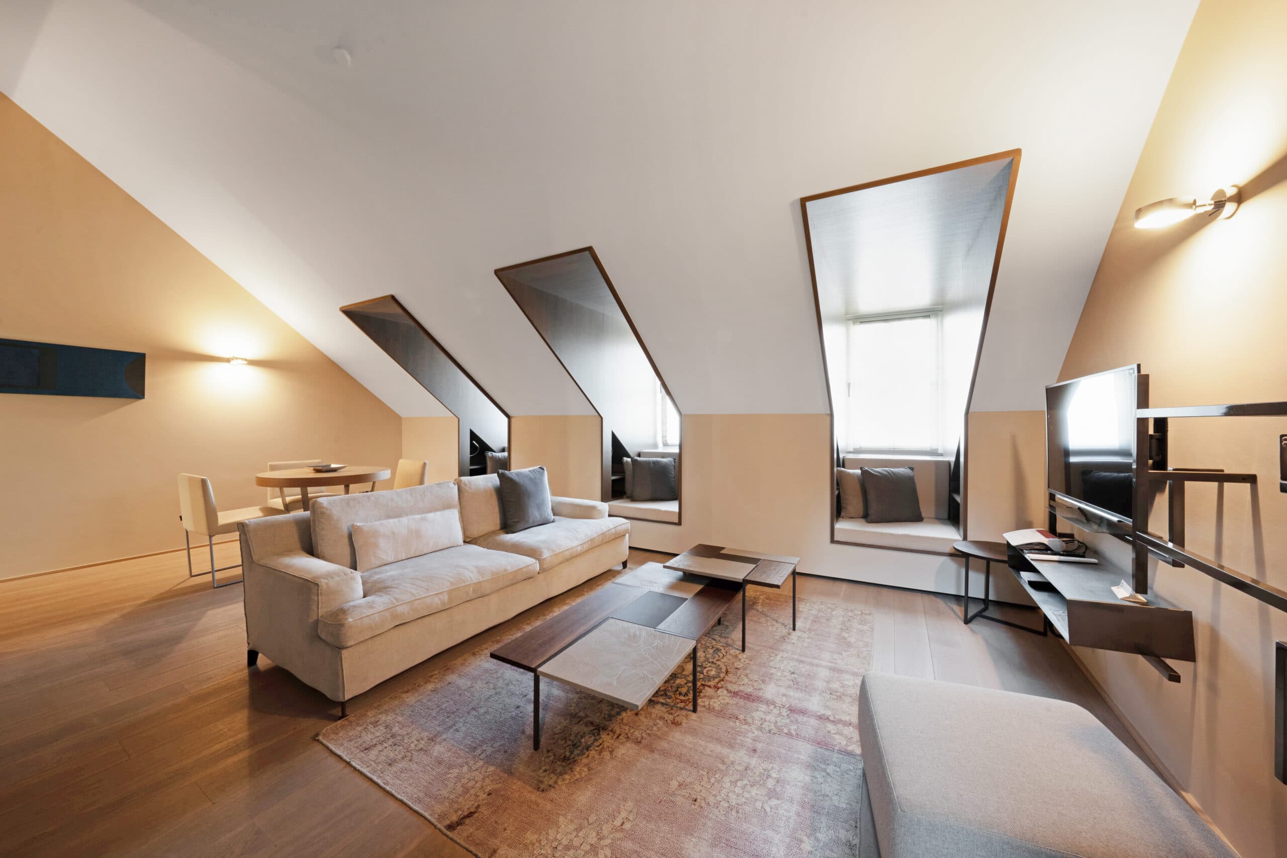 Top-floor penthouse interior at Relais Louvigny.